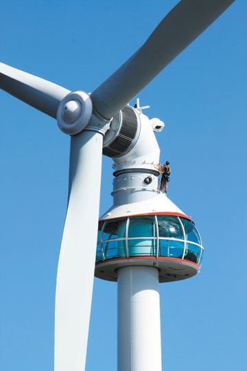 Wind Turbine Tower with Viewing Deck Built on Top of Grouse Mountain near Vancouver Wind Turbine Tower with Viewing Deck Built on Top of Grouse Mountain near Vancouver